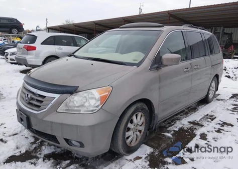 2010 Honda Odyssey Ex-L z USA, uszkodzony, nr VIN 5FNRL3H7XAB099429